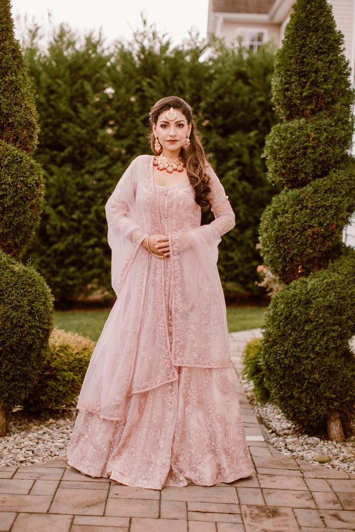 Baby Pink Heavy Net and Silk Bridal Anarkali Gowns for Rent - Glamourental