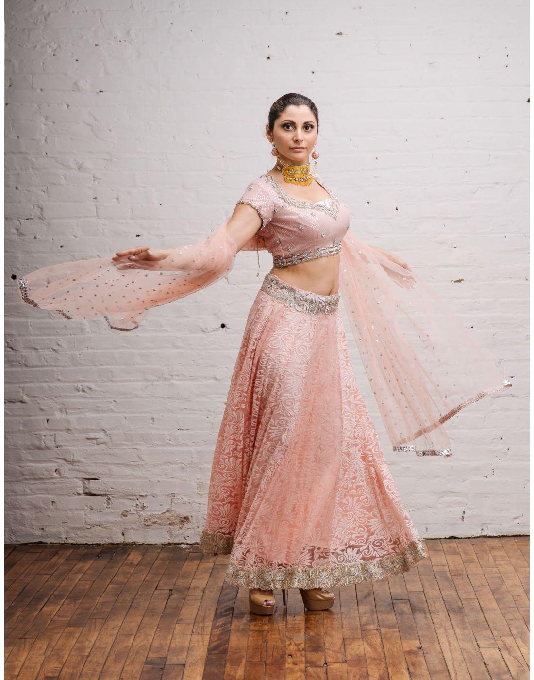 Rent Pink Silk Embroidered Blouse with Brasso Lehenga Accompany in Net Lehenga-Women-Glamourental