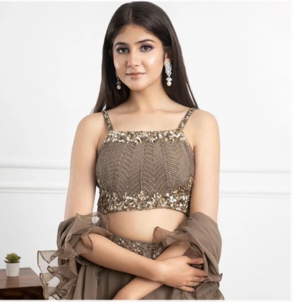 Designer Kanika Kapoor's Stylish Designer Grey Color Ruffle Lehenga - Rent