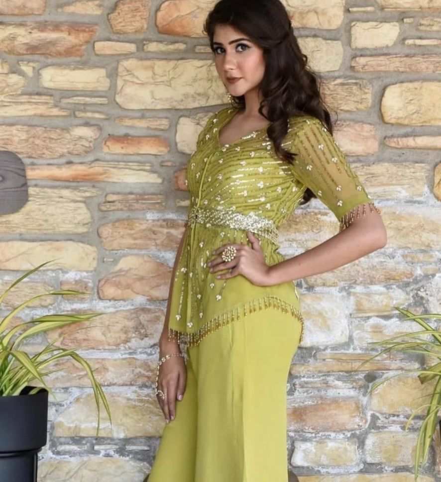 Designer Kanika Kapoor's Green Color Net Dress with Georgette Bottom - Rent