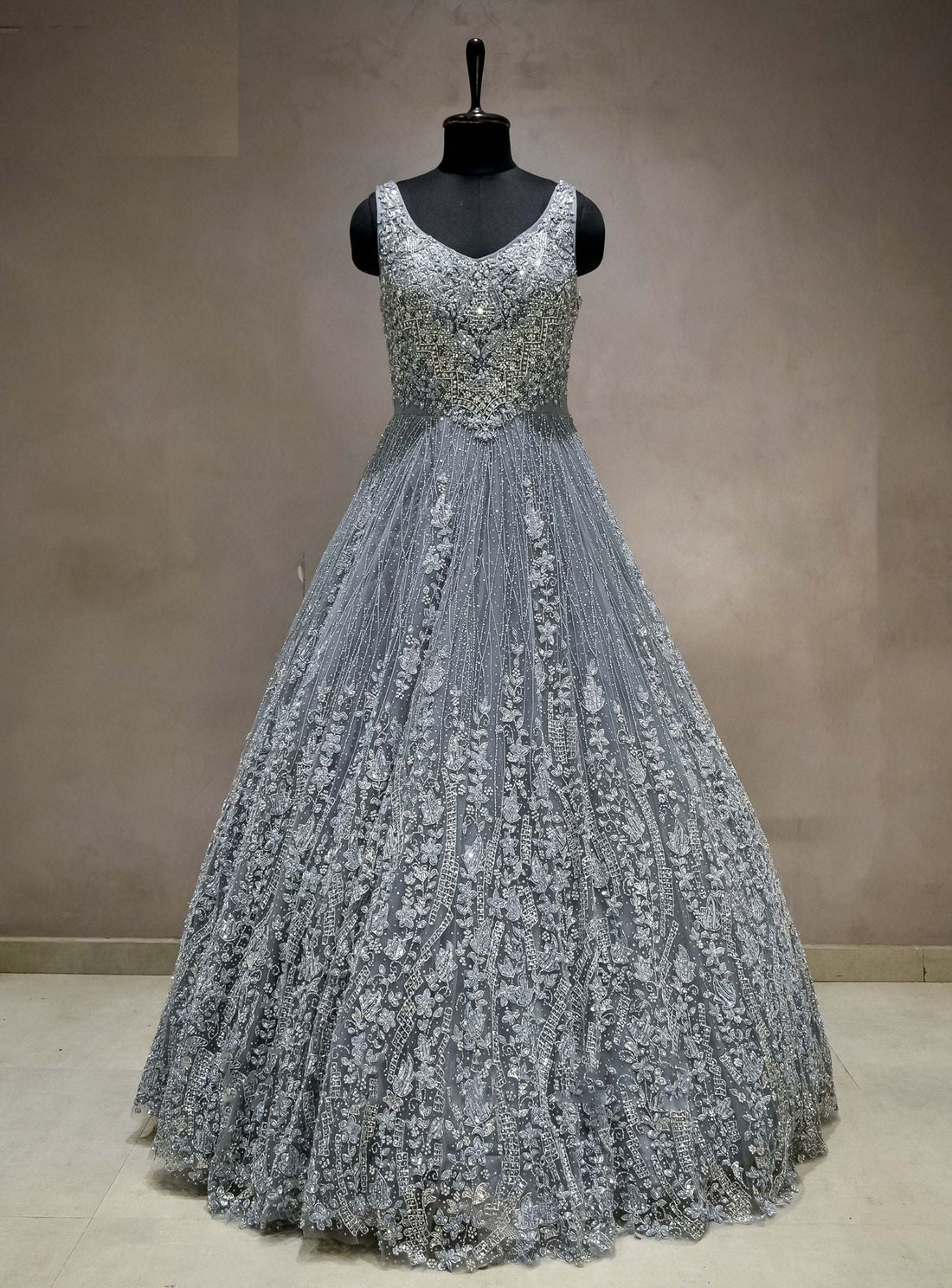 Meraj couture's sleeveless Dark Grey Gowns - RENT