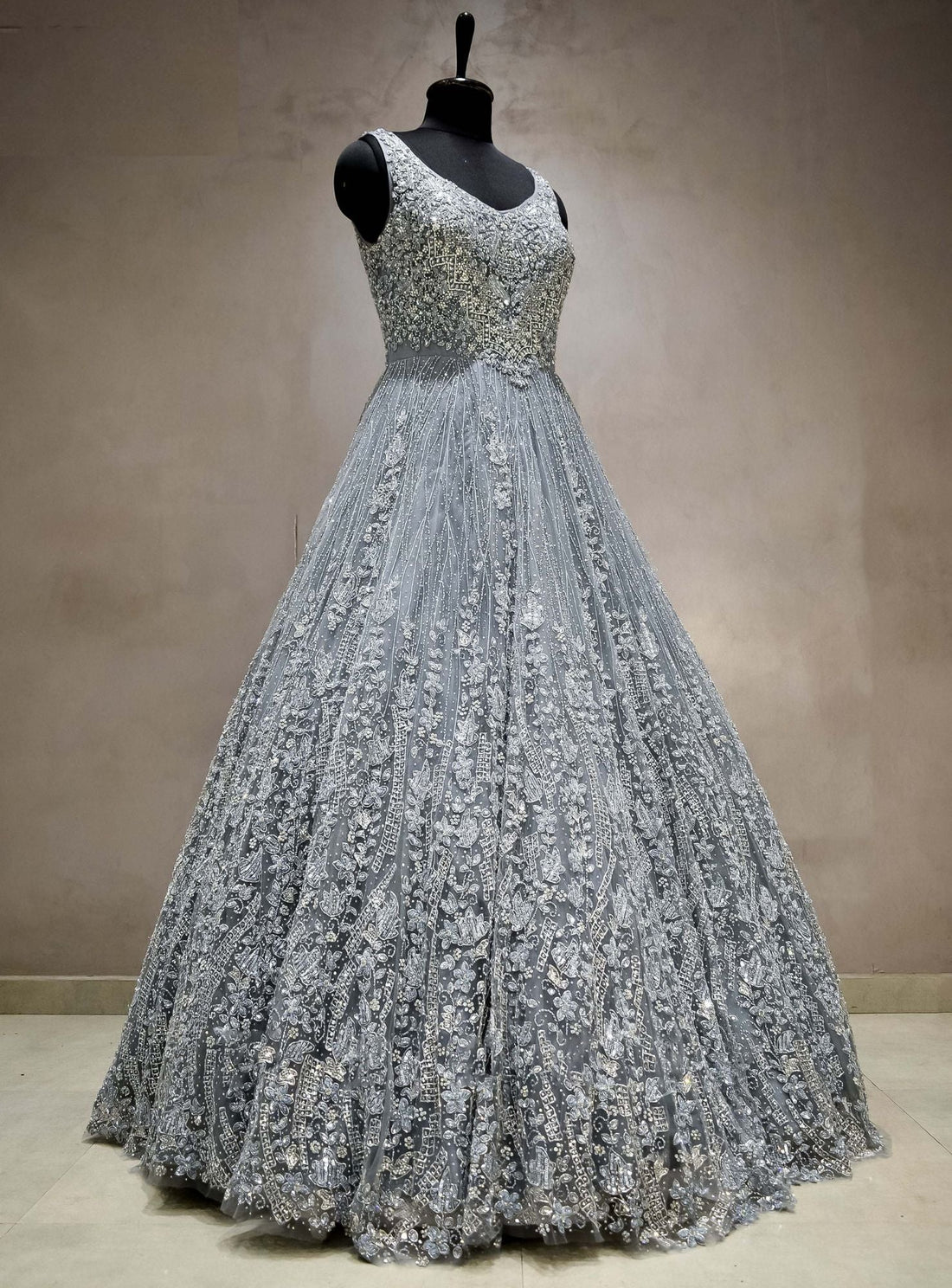 Meraj couture's sleeveless Dark Grey Gowns - RENT