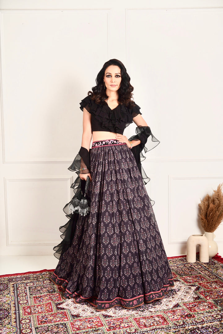 Designer Rashika's Black ruffled blouse and printed lehenga- Rent