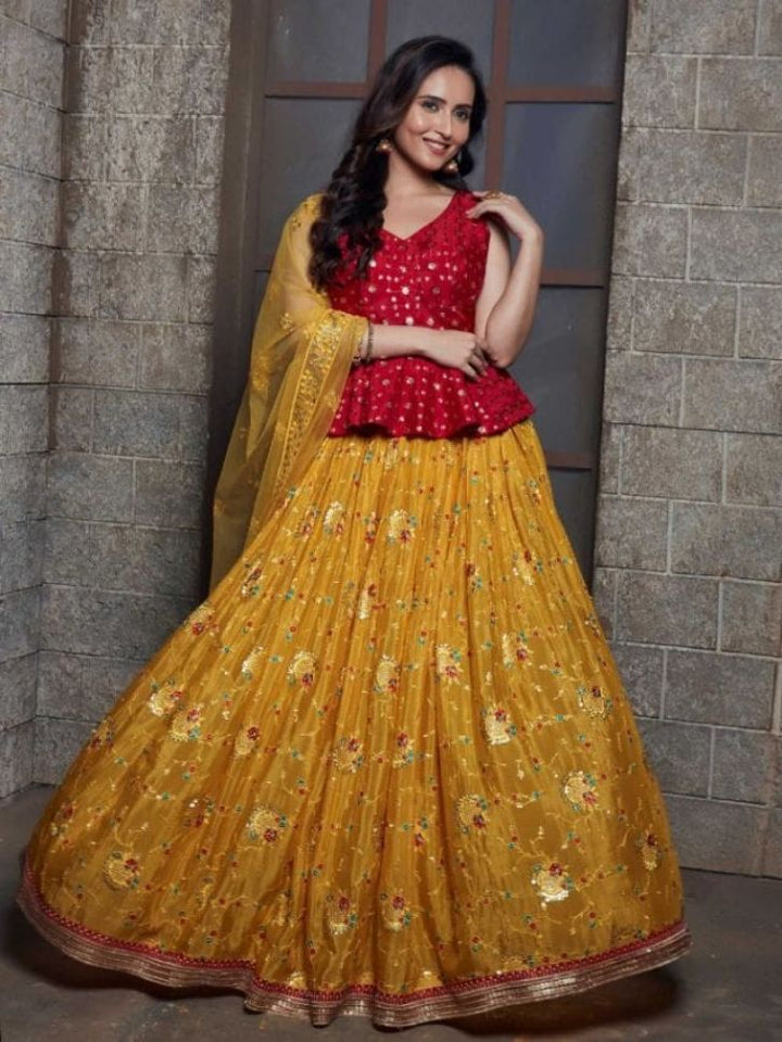 Yellow and Red Color Embroidered Viscose Georgette Lehenga - Rent