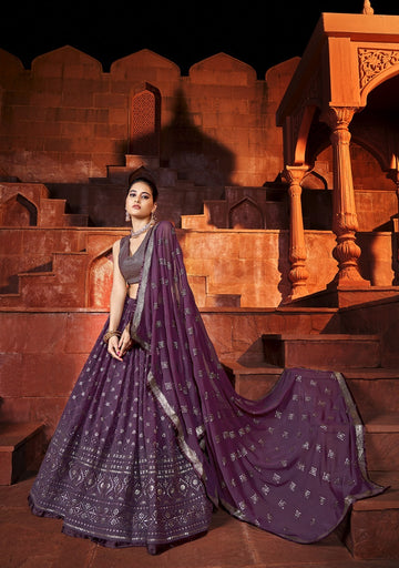 Elegant purple colored Embroidered Lehenga - Rent