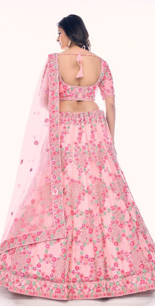 Beautifully designed Pink colored Embroidered Lehenga - Rent