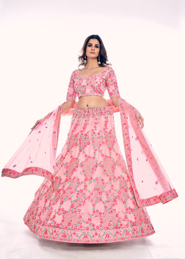 Beautifully designed Pink colored Embroidered Lehenga - Rent