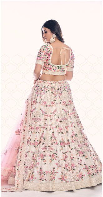 Off white colored Pearl Embroidered Lehenga - Rent