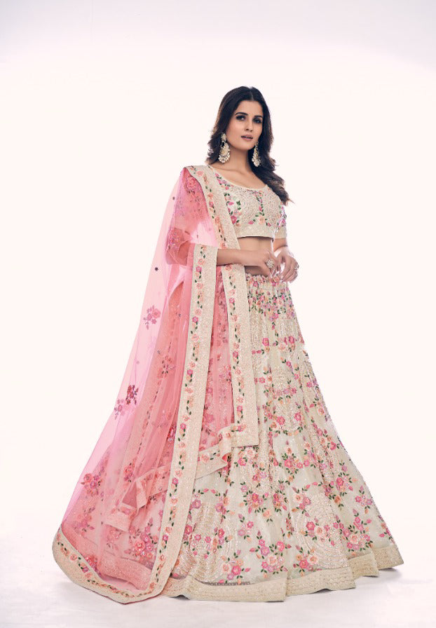 Off white colored Pearl Embroidered Lehenga - Rent