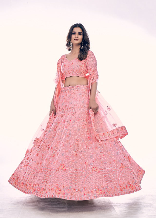 Onion Pink colored Pearl Embroidered Lehenga - Rent