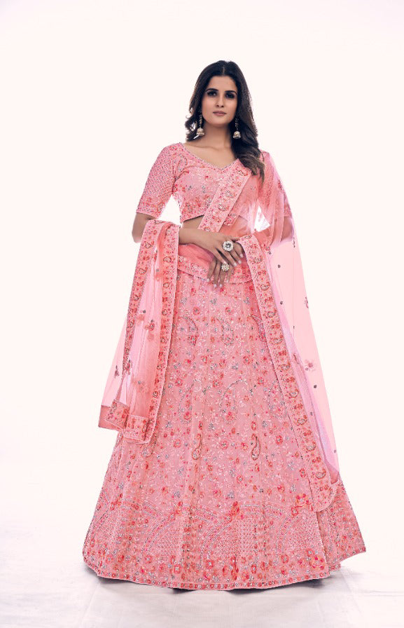 Onion Pink colored Pearl Embroidered Lehenga - Rent