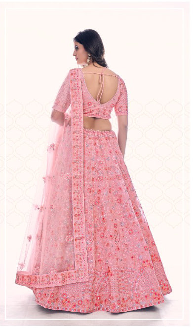 Onion Pink colored Pearl Embroidered Lehenga - Rent