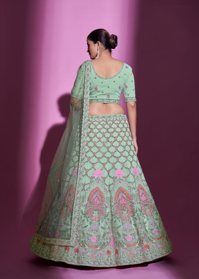 Timeless Pista green colored Heavy Embroidered Lehenga Set - Rent