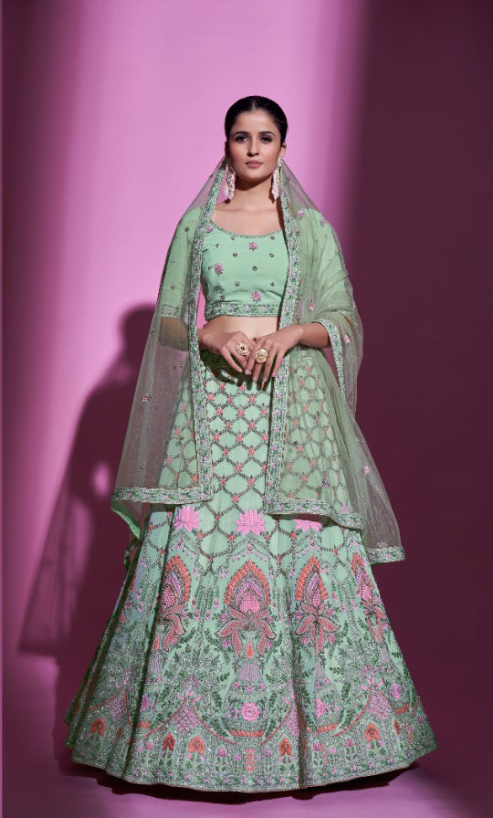 Timeless Pista green colored Heavy Embroidered Lehenga Set - Rent