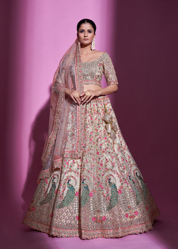 Uniquely designed Cream Heavy Embroidered Lehenga Set - Rent