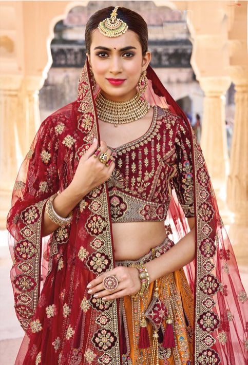 Classy Maroon and mustard heavy embroidered Lehenga Set- Rent