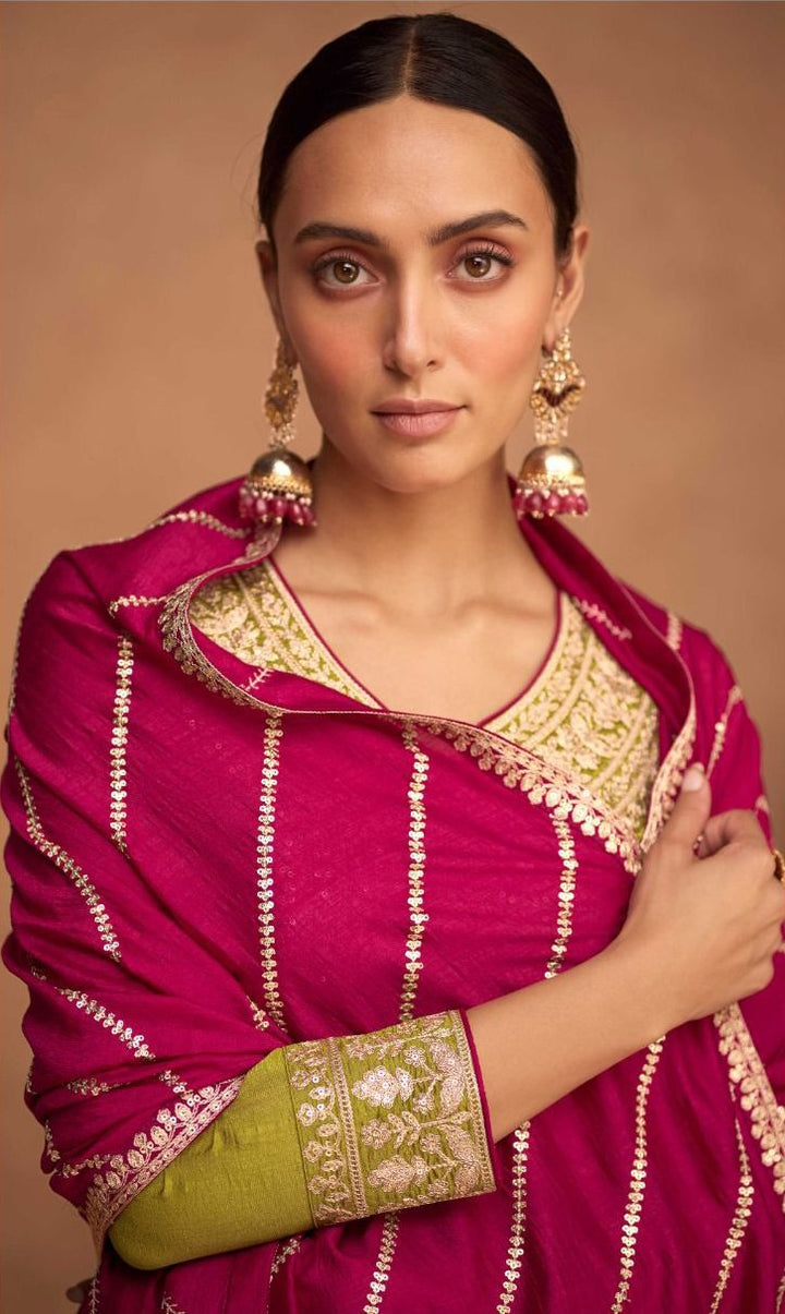 Beautiful Mehndi and Pink colored heavy embroidered kurta set  - Rent