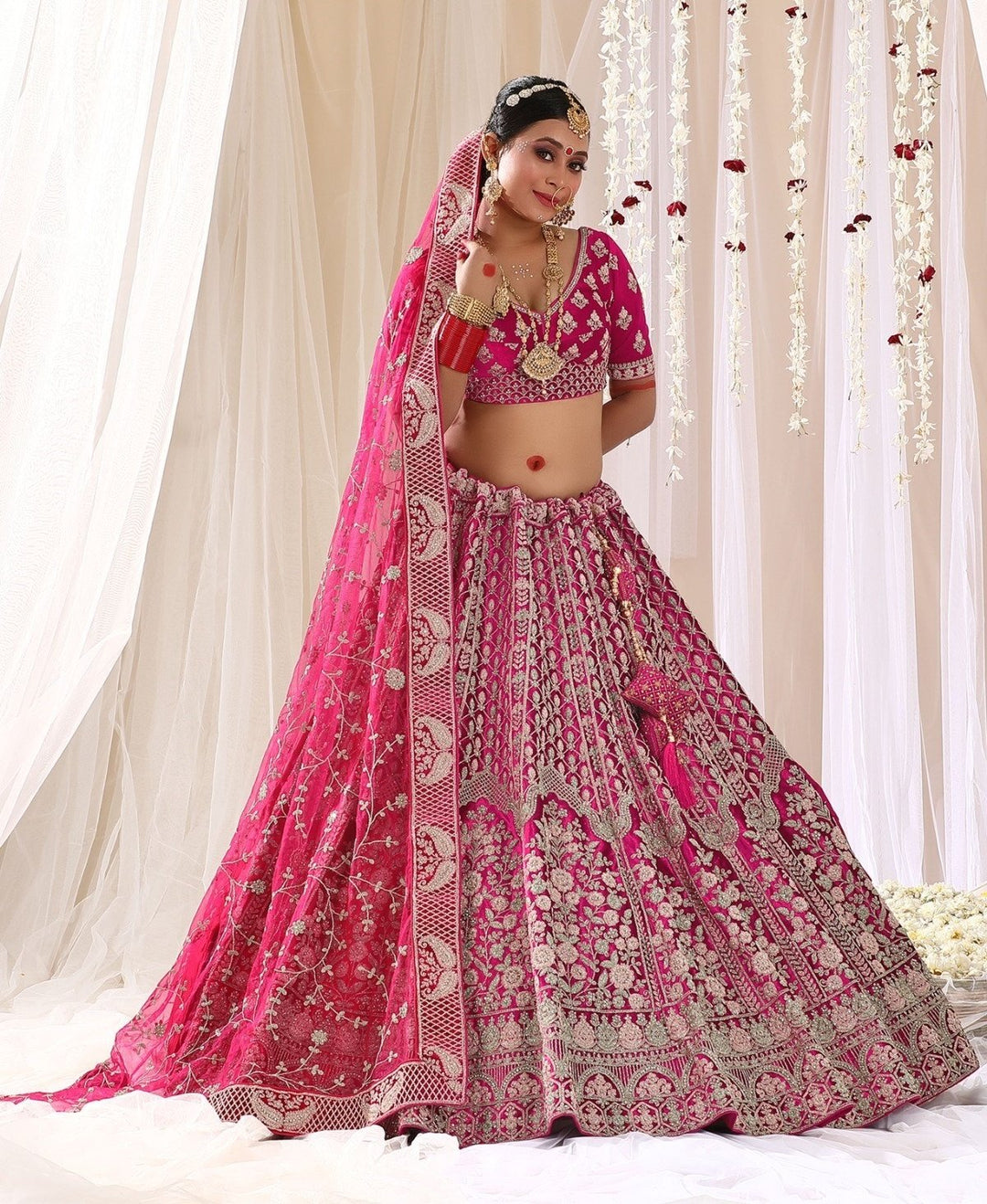 Georgette Pink colored Heavy Embroidered Bridal Lehenga Set - Rent