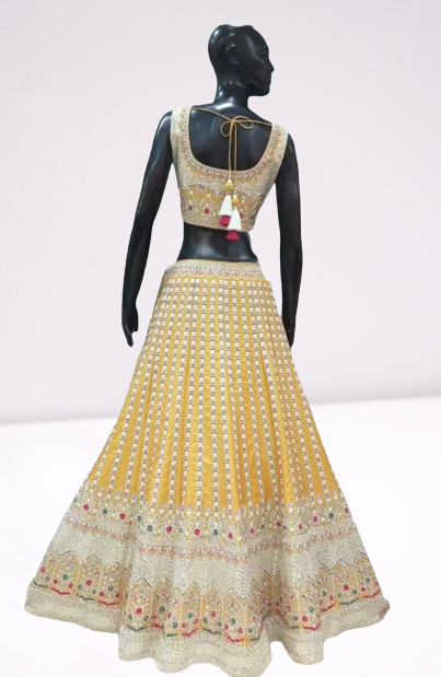 Yellow colored Beautifully designed Lehenga Set - Rent