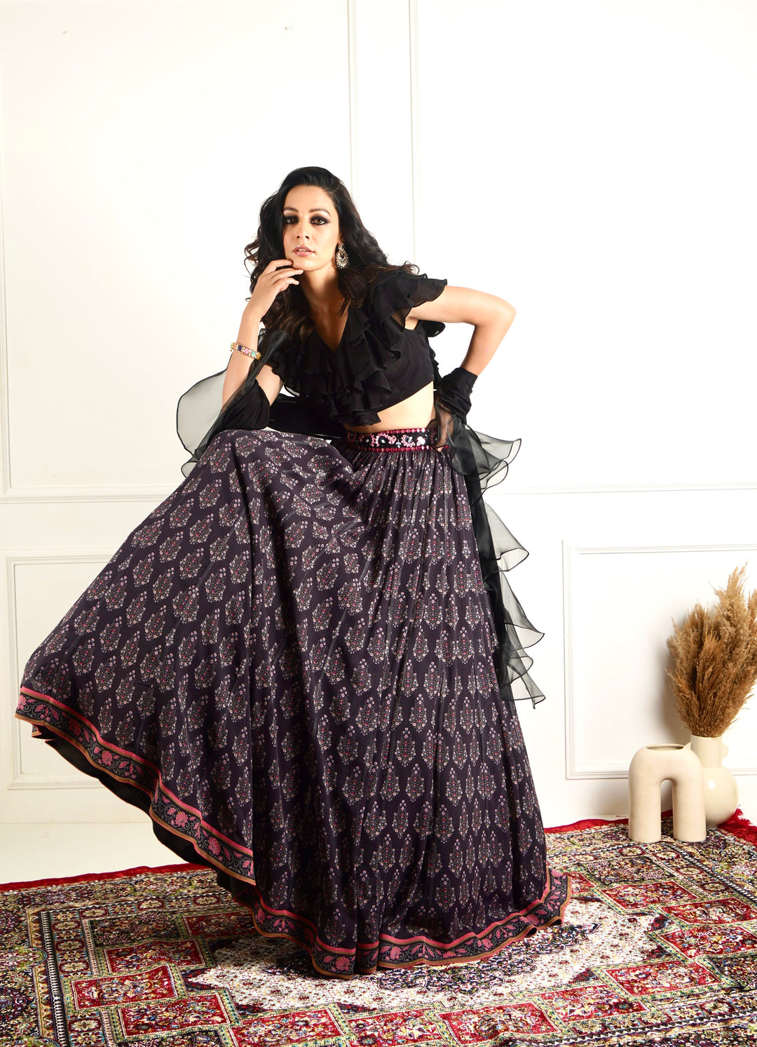 Designer Rashika's Black ruffled blouse and printed lehenga- Rent